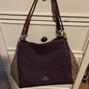 Coach signature double handheld shoulder bag .. burgundy